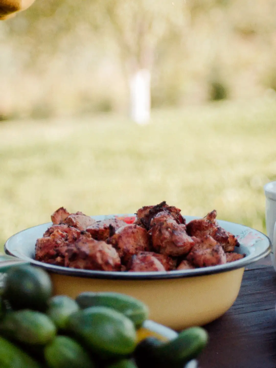 A picture of BBQ on an old wooden table. Created and photographed by Hiroku
