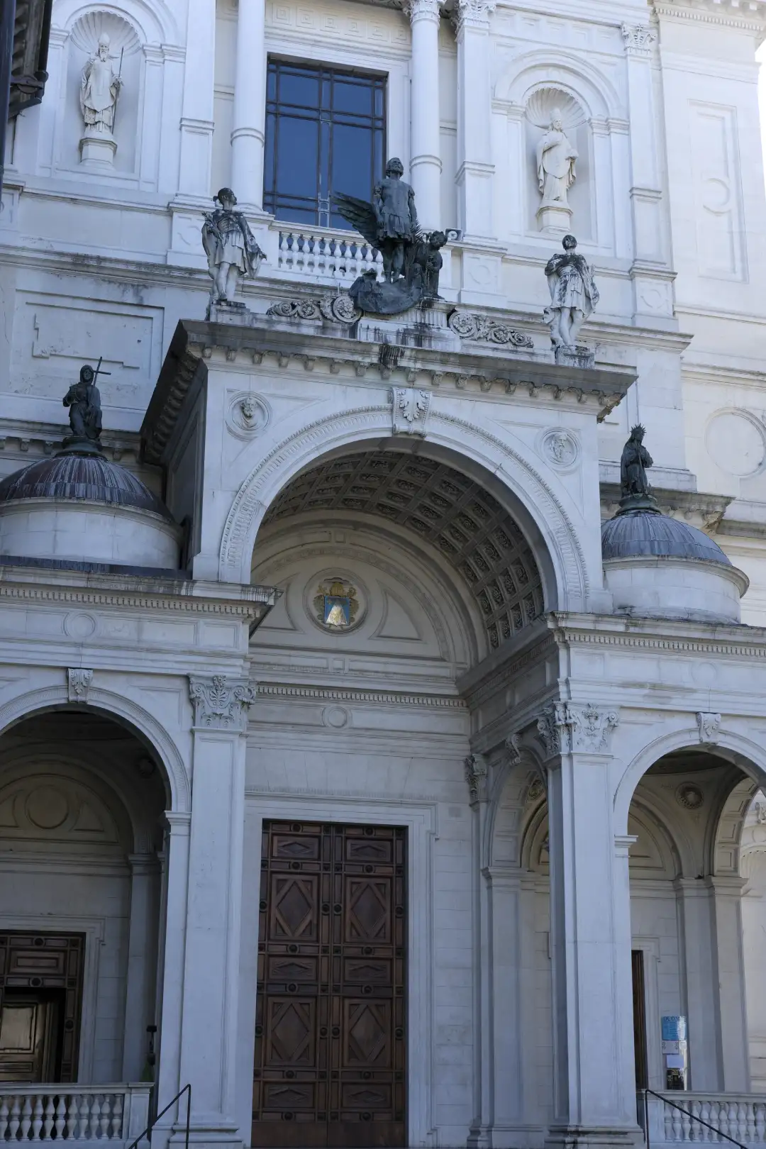Architectural photo depicting an old church entrance with interesting designs. Created and photographed by Hiroku