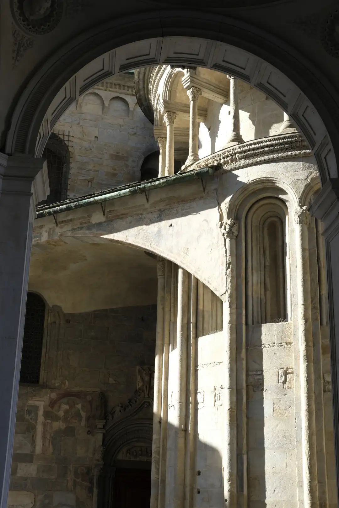 A sunlit church wall with an interesting composition. Created and photographed by Hiroku