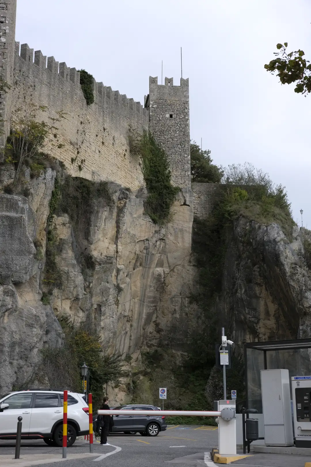 A cliff with an old castle wall sitting atop of it. Created and photographed by Hiroku