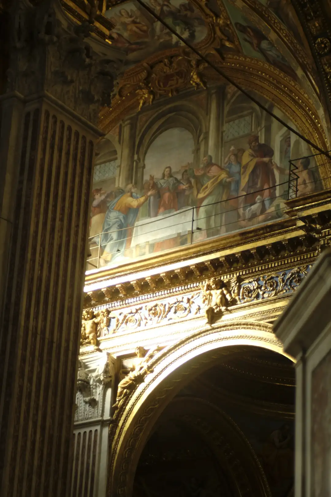 An old church with a painting and a bunch of gold detailing. Created and photographed by Hiroku